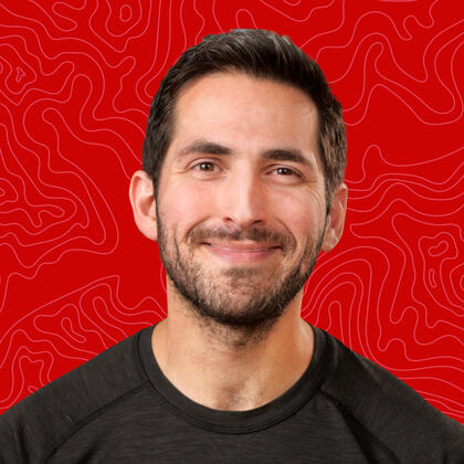 Joey Daoud headshot on red background